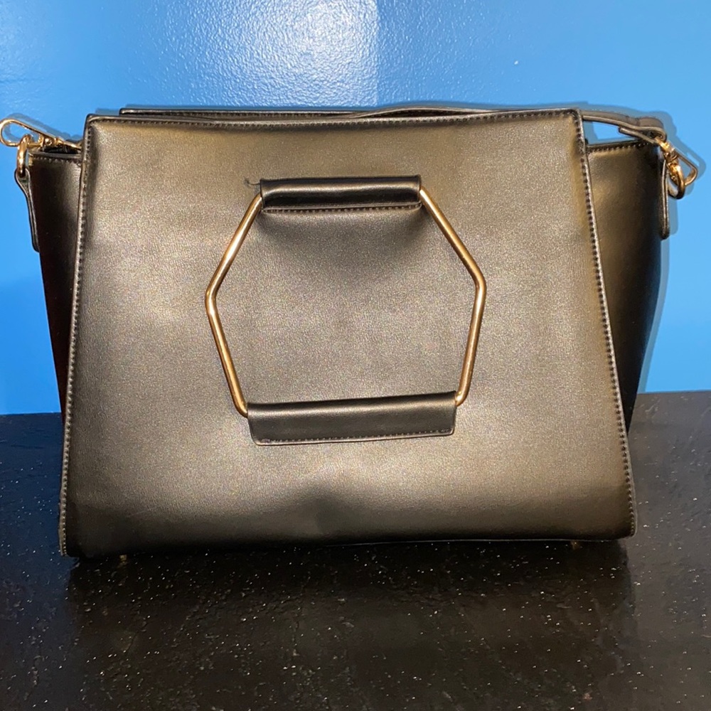 Miztique black medium size purse.
